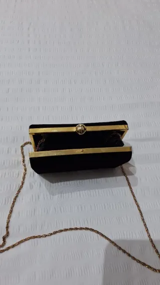 Bolso de fiesta negro y dorado