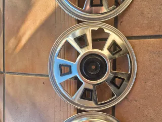 Juego de 4 tapacubos plateados