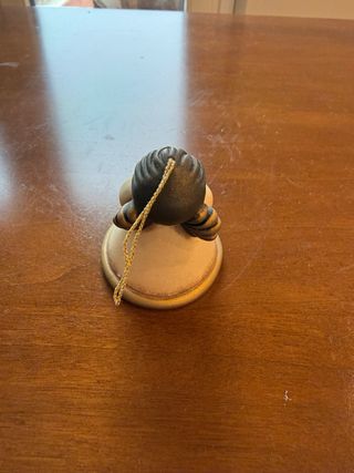 Angelo decorativo THUN con cuore dorato