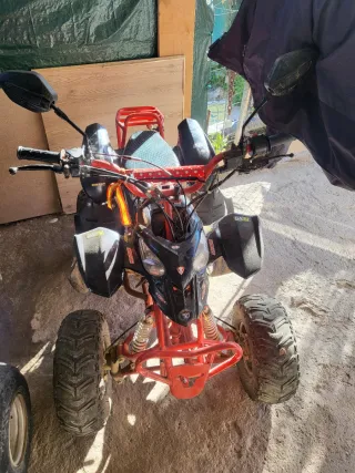 Quad infantil negro y rojo