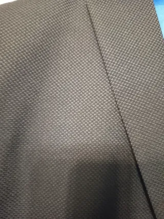 Traje de caballero negro con forro azul