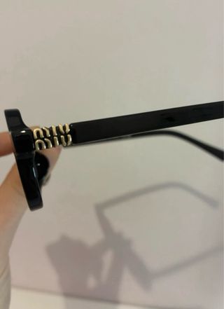 Gafas de sol Miu Miu negras