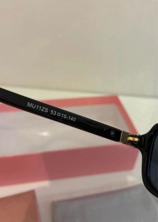 Gafas de sol Miu Miu negras
