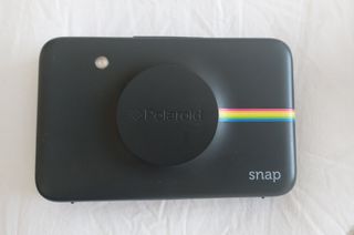 Cámara Polaroid Snap + Funda + Papel fotográfico