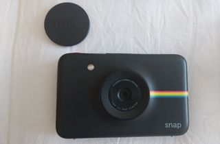 Cámara Polaroid Snap + Funda + Papel fotográfico