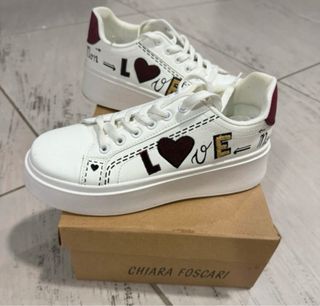 Sneakers donna bianche con dettagli rossi