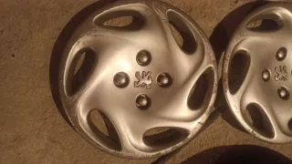 Tapacubos originales Peugeot 206