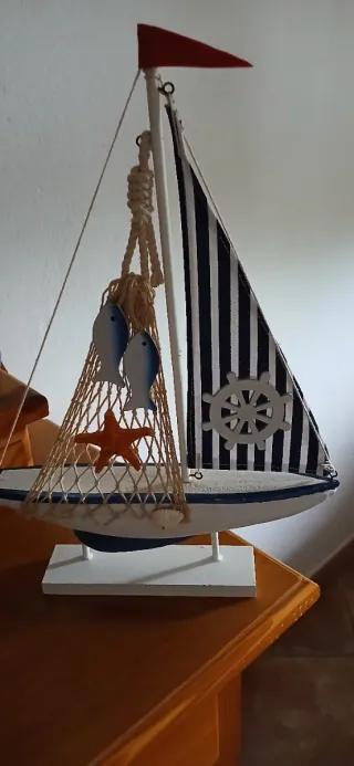 Barco de madera decorativo medida 40cm alto por 28