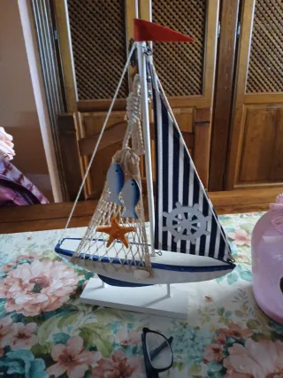 Barco de madera decorativo medida 40cm alto por 28