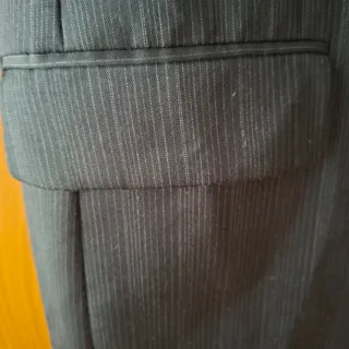 Americana hombre negra a rayas.