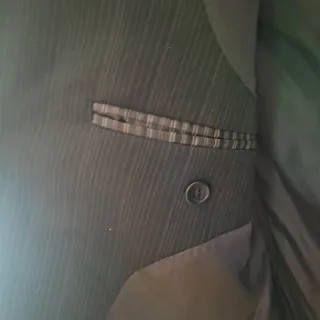 Americana hombre negra a rayas.