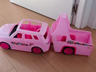 Coche de juguete rosa para muñecas