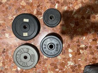 Barras, discos y mancuernas para gimnasio