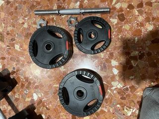 Barras, discos y mancuernas para gimnasio