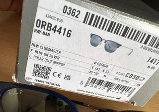 Gafas de sol Ray-Ban azules y plateadas