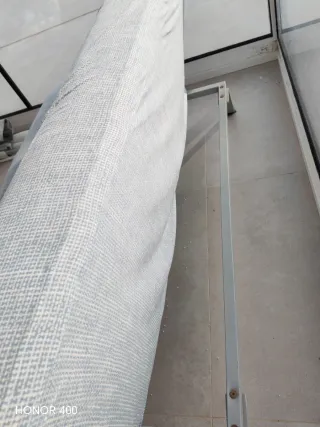 Sofá Cama Naranja Tela con funda azul clara