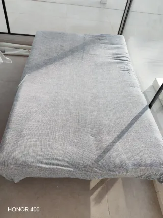 Sofá Cama Naranja Tela con funda azul clara