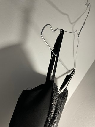 Tuta jumpsuit nera con paillettes