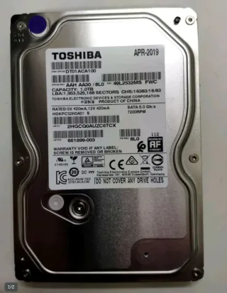 2 Discos de 1TB " Toshiba 12326H y Seagate 1588H "