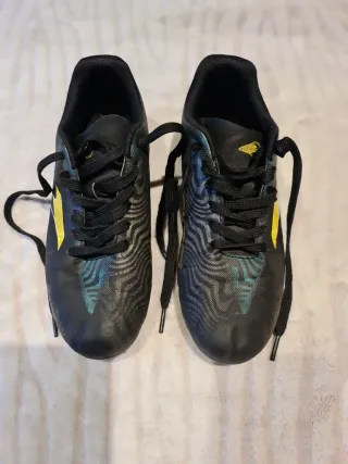 Zapatillas Fútbol Joma Negras y Doradas