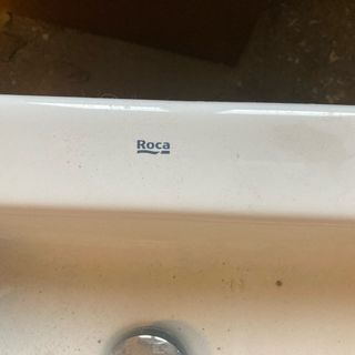 Mueble de baño Roca gris y blanco con grifo