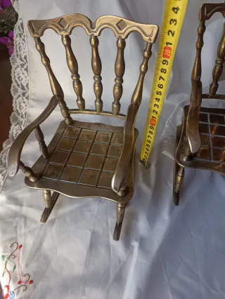 2 dondoli in bronzo in miniatura. 75€/2