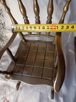 2 dondoli in bronzo in miniatura. 75€/2