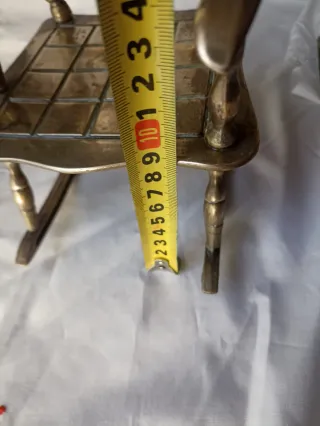 2 dondoli in bronzo in miniatura. 75€/2