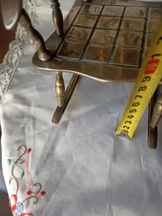 2 dondoli in bronzo in miniatura. 75€/2