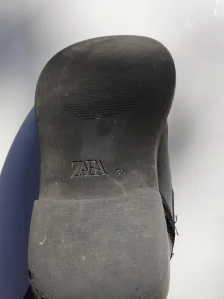 Botines negros con cremallera