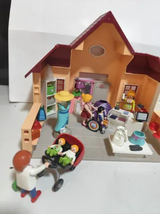 Playmobil Casa Tienda con Figuras