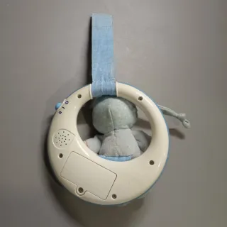 Muñeco musical y luz para bebé