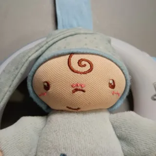 Muñeco musical y luz para bebé