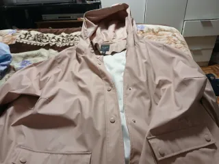 Impermeable rosa talla 56