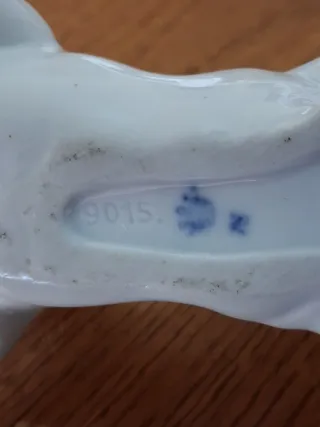 Coppia di putti in ceramica