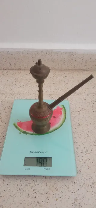 Antiguo objeto árabe de bronce