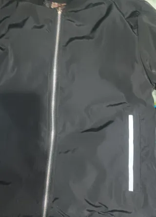 Giubbotto reversibile da uomo nero con teschio