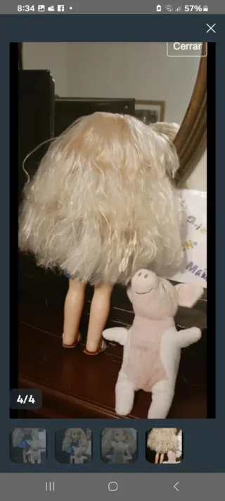 Muñeca Elsa Disney con cerdo de peluche