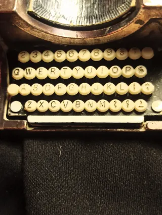 Miniaturas sacapuntas máquina de escribir