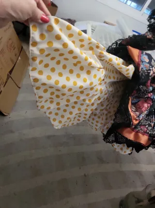 Traje de flamenca volantes negro y naranja