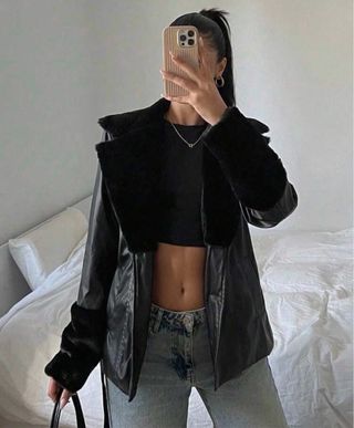 Chaqueta efecto piel negra Talla S