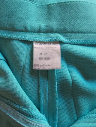 Traje chaqueta y pantalón turquesa