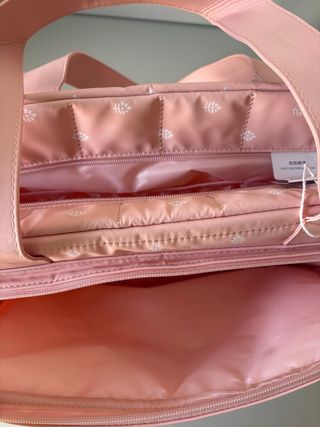 Bolso de viaje rosa estampado