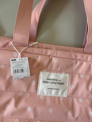Bolso de viaje rosa estampado