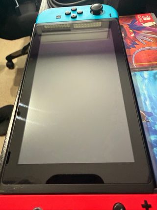 Nintendo Switch + Zelda Breath of the Wild + Pokémon Scarlatto