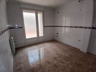 Casa adosada en venta en Tomelloso