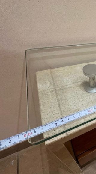 Mobile ingresso in marmo e vetro