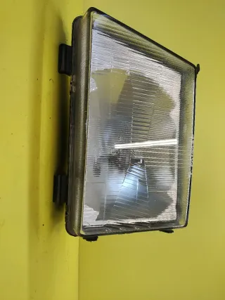 FARO DELANTERO IZQUIERDO MERCEDES MB100 CITYTRANS