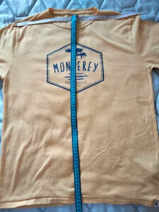 Camiseta amarilla de Scalpers.