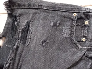 Shorts vaqueros negros desgastados